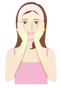 Demaquillage masser visage avec huile