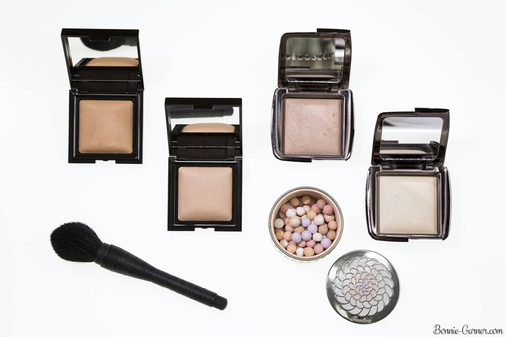 Laura Mercier Candleglow Sheer Perfecting Powder: 01 Fair, 02 Light; Hourglass Ambient Lighting Powder: Diffused Light, Dim Light; Guerlain Les Météorites 02