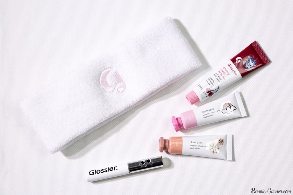 Glossier: headband, Cloud Paint Dusk, Puff; Balm Dotcom Cherry; Boy Brow Brown